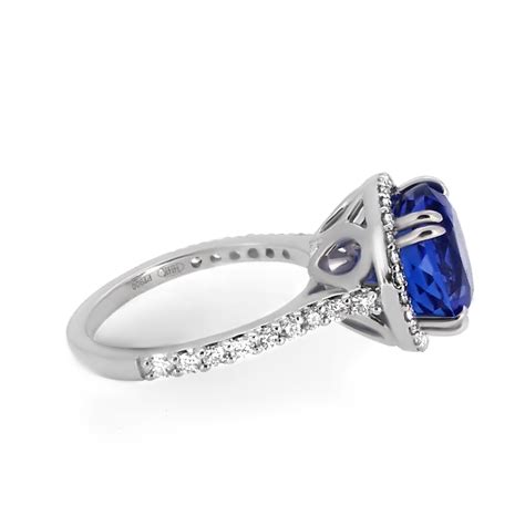 Round Sapphire and Diamond Halo Engagement Ring - Haywards of Hong Kong