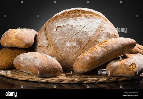 bread  black background stock photo alamy