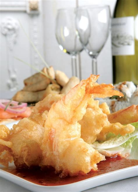 Shrimp Appetizer with Sauce and Wine Glasses - Prepared Food Photos, Inc.