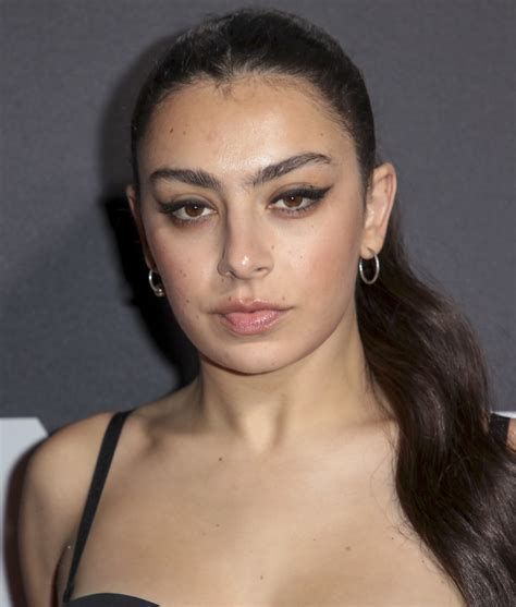 Charli XCX – Sexy Boobs in Black Top at NME Awards 2020 in London - Hot
