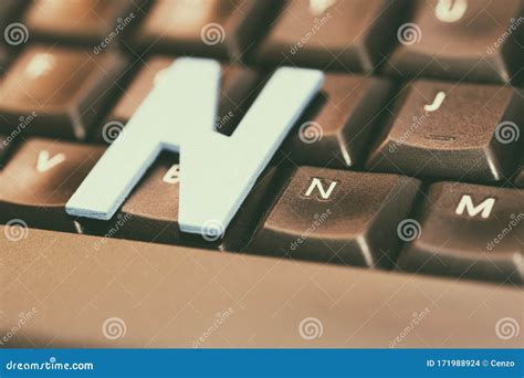 Small Wooden Letter `N` on Black Computer Keyboard Stock Photo - Image ...