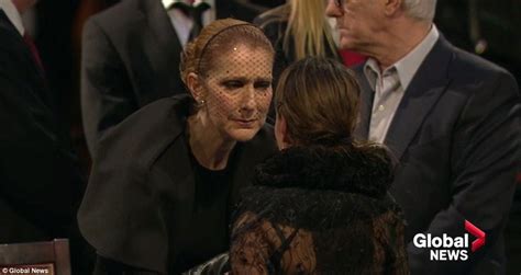 Celine Dion at her husbands visitation...touches his face in his open