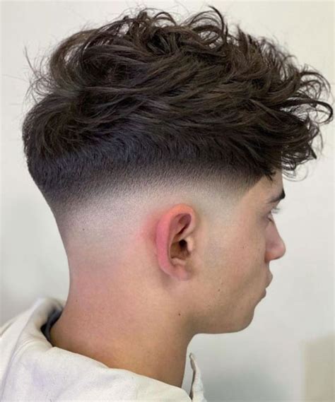 trendy  taper fade messy top styles  men  taper fade