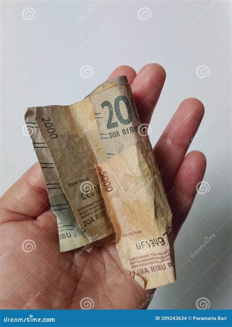 Close Up of a Hand Showing Several Banknotes of 2000 Rupiah and 5000 Rupiah Denominations Stock ...