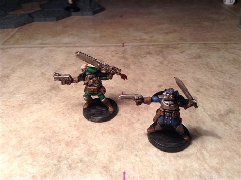 imperial guard  bolter  chainsword