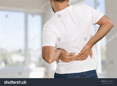 backache stock photo  shutterstock