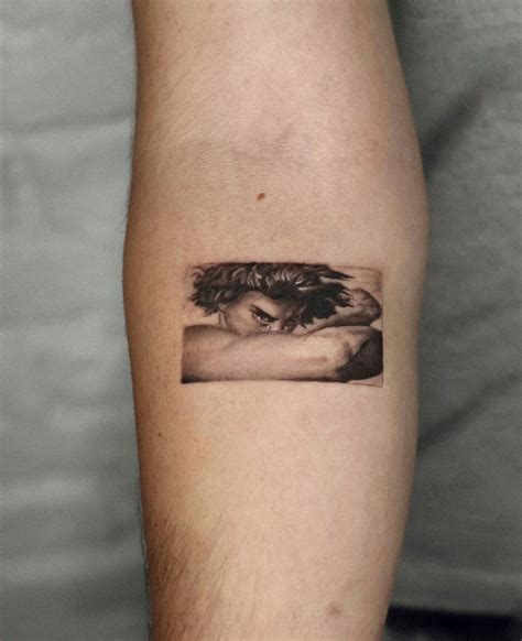 fallen angel tattoo meaning 9