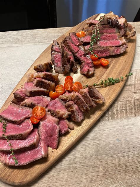 21 day dry-aged ribeyes from local butcher. Undercooked? - Dining and