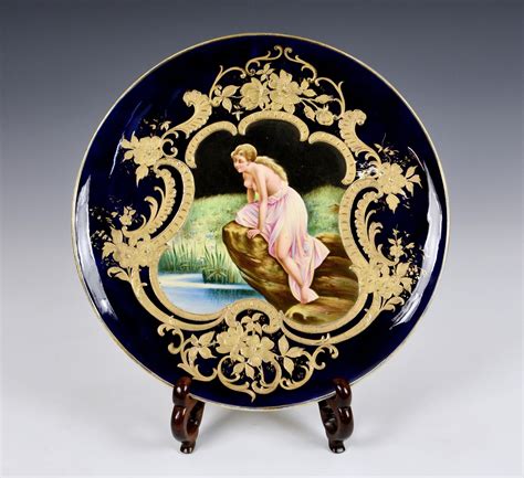 Lot - A 20th century Neoclassical style charger the centre depicting a