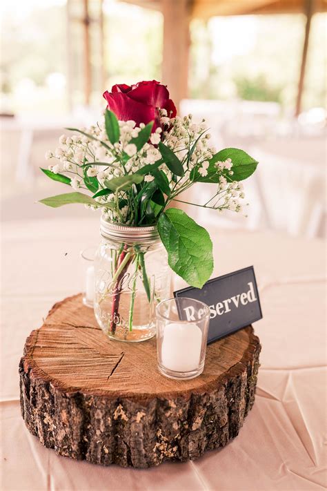 Rustic Mason Jar Wedding Centerpiece with Red Roses and Greenery