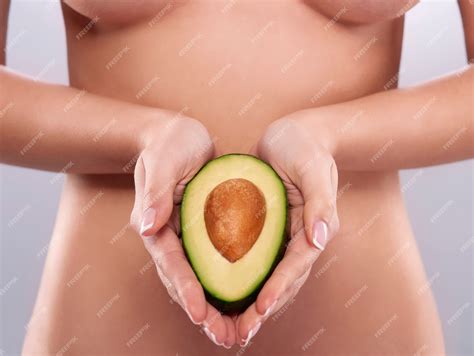 Free Photo | Naked woman holding the fresh avocado