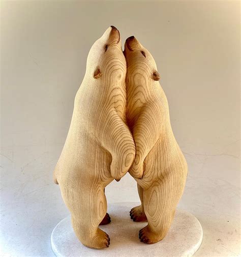 Elegant Animals Commune and Contemplate in Hand-Carved Wooden
