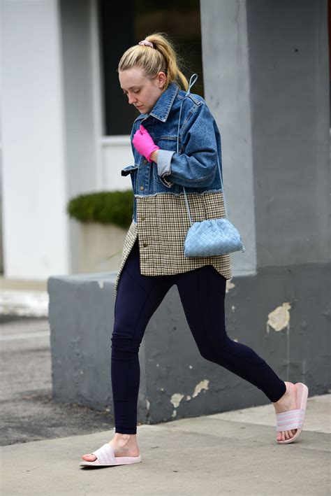 Dakota Fanning Wears Pink Latex Gloves Amid Coronavirus Outbreak in LA