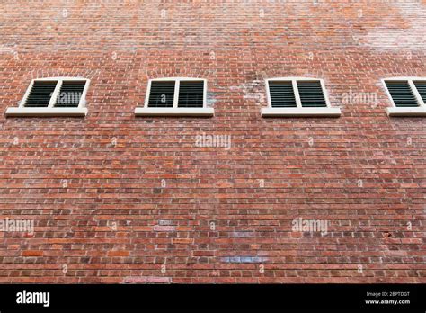 Red brick building architecture Stock Photo - Alamy