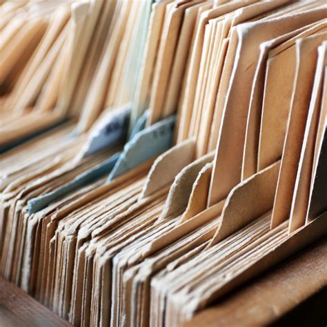 How long should a written warning be kept on file? 