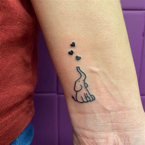 elephant symbol tattoo 1