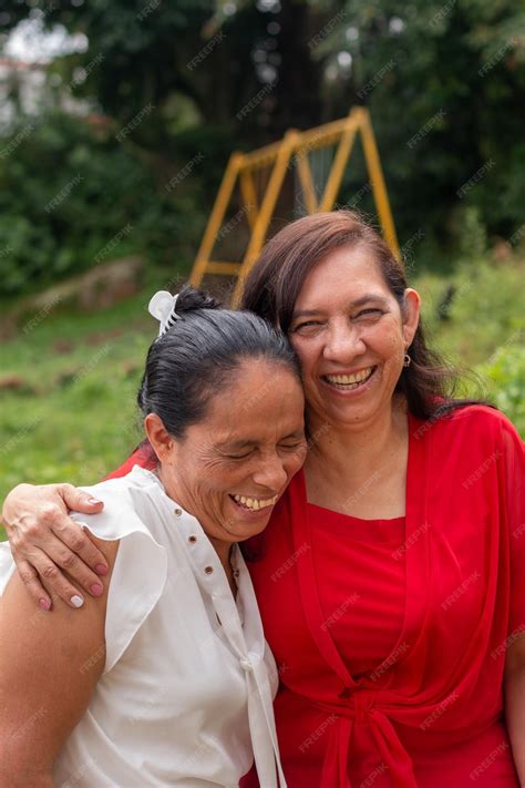 Premium Photo | Vertical photo of portrait of two older latin women