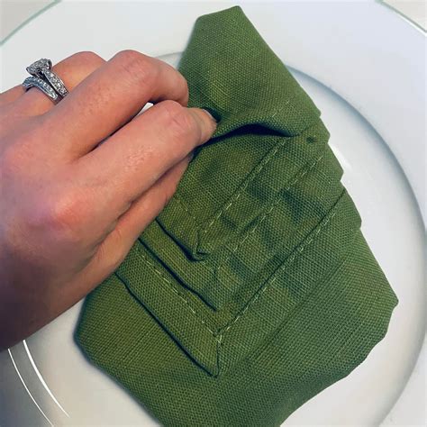 how to fold serviettes with cutlery 8