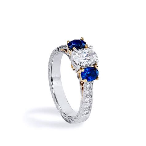 Platinum and 18kt Yellow Gold GIA Certified Diamond and Sapphire Ring
