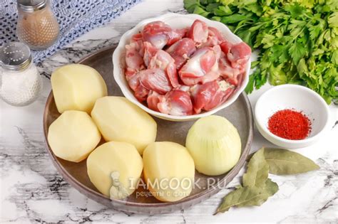 Тушеные куриные желудки с картошкой в казане — рецепт с фото пошагово