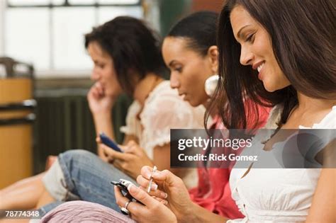 women sending text messages high res stock photo getty images