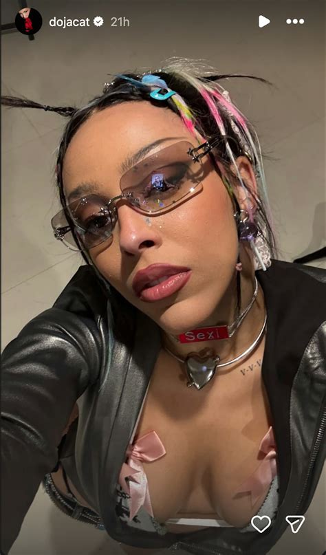 Doja Cat’s Bikini, Micro Miniskirt, & Naked Heels Are So Dollcore-Coded