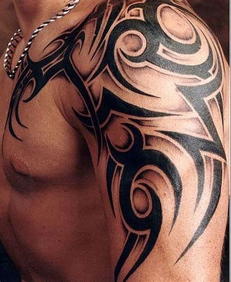 tribal upper arm tattoo