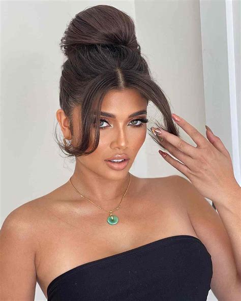 High Bun Hairstyles With Bangs