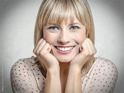 excited blond girl stock photo adobe stock