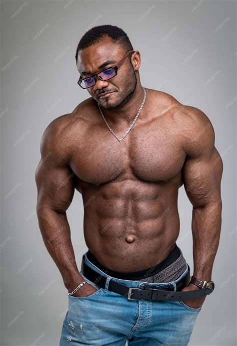 Premium Photo | Strong african guy with big biceps and great abs