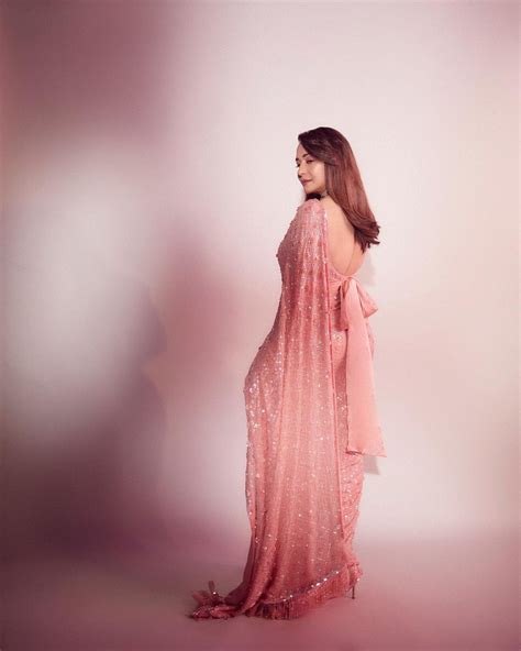 madhuri dixit spells elegance  white   embellished saree