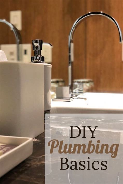 a kitchen sink sitting under a faucet next to a counter top with the