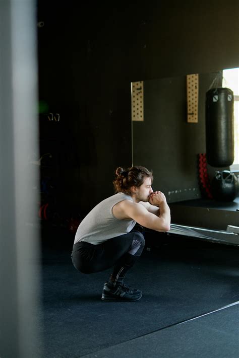 Man Doing Squats · Free Stock Photo