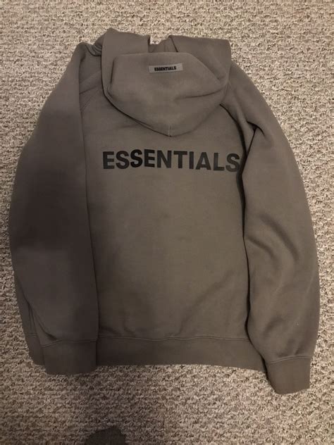 Fear of God Essentials Zip Up Hoodie | Grailed