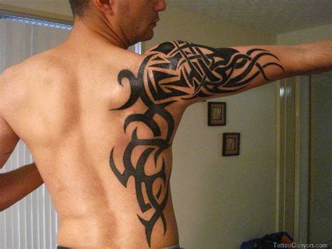 tattoo ideas de tribal no braço - Fotos de tatuagens para servir de