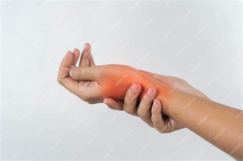 Premium Photo | A persons hand is red and swollen possibly from an injury