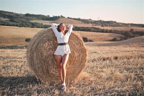Beautiful Woman Posing with Hay · Free Stock Photo