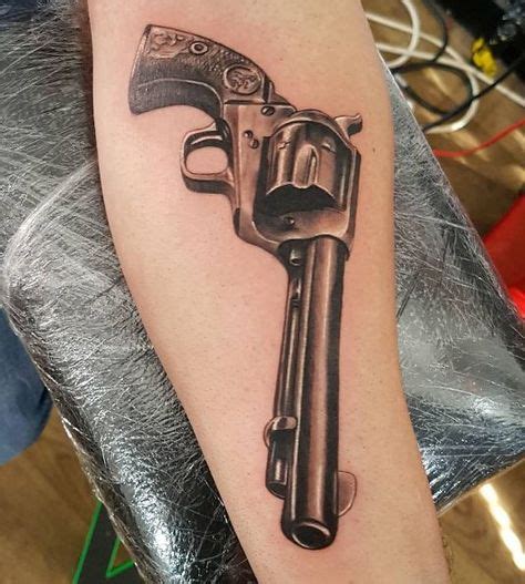 Revolver tattoo