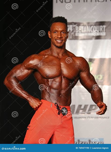 Hunky Male Bodybuilder Strikes a Pose Editorial Image - Image of