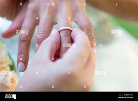 wedding ring getting married marriage ceremony finger hands Stock Photo ...