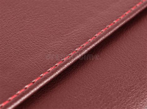 red leather texture  red stitching part  perforated leather