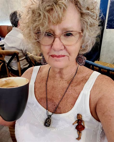 Wearing my cute wood articulated brooch gifted to me by my daughter