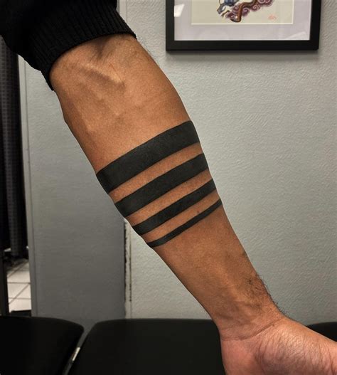 bicep band tattoos
