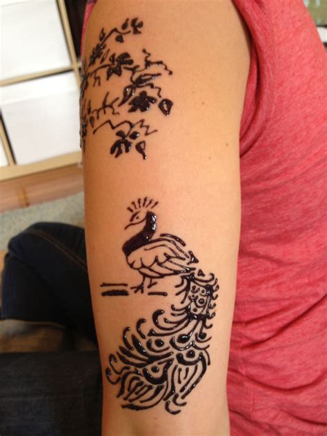 Jagua tattoo-peacock and cherry blossom | Jagua tattoo, Tattoos, Tattoo inspiration