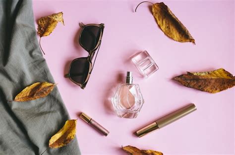 Premium Photo | Set of lady accessories on pink