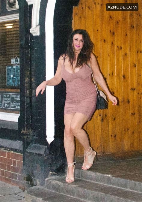 Lisa Appleton seen stumbling out of pub before an embarrassing nip slip