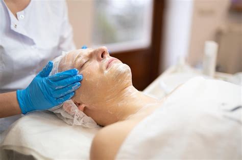 Premium Photo | Cosmetic procedures on a man's face in a beauty salon