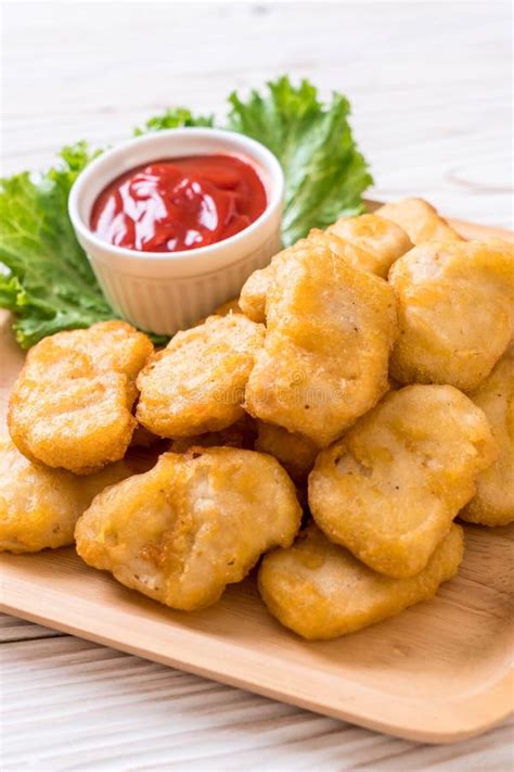 Chicken nuggets with sauce stock image. Image of meal - 140456463