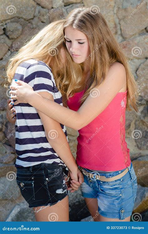 Young Girls Hug stock image. Image of caucasian, adult - 33723073