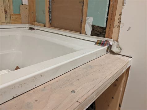 Finishing front edge of a drop-in tub. I am considering building up